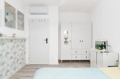Łóżko lub łóżka w pokoju w obiekcie Cozy Attic