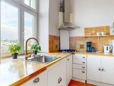 Kuchnia lub aneks kuchenny w obiekcie City Elegance Premium Apartment Balcony AC