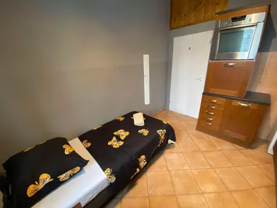Łóżko lub łóżka w pokoju w obiekcie Fantastic-Inn Warszawa - CH16