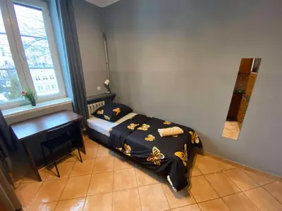 Łóżko lub łóżka w pokoju w obiekcie Fantastic-Inn Warszawa - CH16