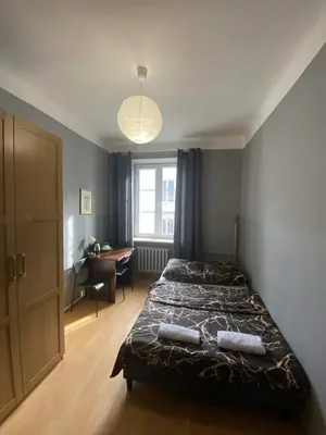 Łóżko lub łóżka w pokoju w obiekcie Fantastic-Inn Warszawa - CH16