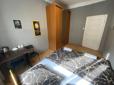 Łóżko lub łóżka w pokoju w obiekcie Fantastic-Inn Warszawa - CH16
