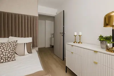 Łóżko lub łóżka w pokoju w obiekcie Kępna Lumière Apartment by Solarento