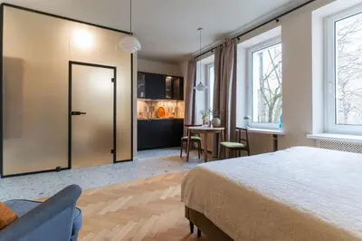 Łóżko lub łóżka w pokoju w obiekcie Warsaw Concierge Mazowiecka