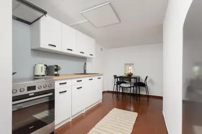 Kuchnia lub aneks kuchenny w obiekcie Metro Plac Wilsona Cozy Apartments by Noclegi Renters