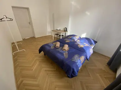 Łóżko lub łóżka w pokoju w obiekcie Fantastic-Inn Warszawa - CH10