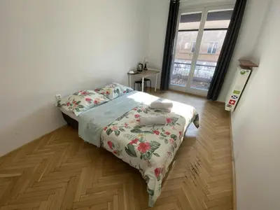 Łóżko lub łóżka w pokoju w obiekcie Fantastic-Inn Warszawa - CH10