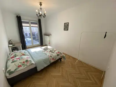 Łóżko lub łóżka w pokoju w obiekcie Fantastic-Inn Warszawa - CH10