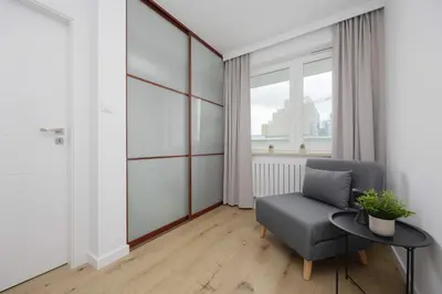 Część wypoczynkowa w obiekcie Łucka Bright Apartment with Parking in Warsaw by Noclegi Renters
