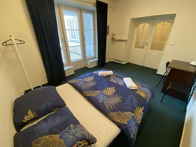 Łóżko lub łóżka w pokoju w obiekcie Fantastic-Inn Warszawa - NS42