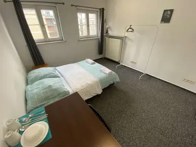 Łóżko lub łóżka w pokoju w obiekcie Fantastic-Inn Warszawa - NS42