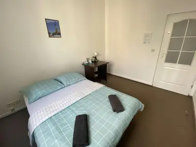 Łóżko lub łóżka w pokoju w obiekcie Fantastic-Inn Warszawa - NS42