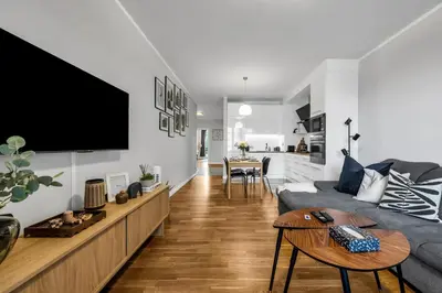 Telewizja i/lub zestaw kina domowego w obiekcie Wola Prestige Apt - Parking, Balcony - By Rentujemy