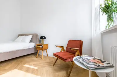 Łóżko lub łóżka w pokoju w obiekcie Apartament Warszawski Sznyt