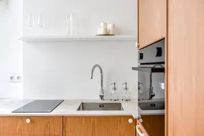 Kuchnia lub aneks kuchenny w obiekcie Apartament Warszawski Sznyt