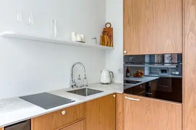 Kuchnia lub aneks kuchenny w obiekcie Apartament Warszawski Sznyt
