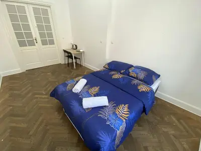 Łóżko lub łóżka w pokoju w obiekcie Fantastic-Inn Warszawa - NS51