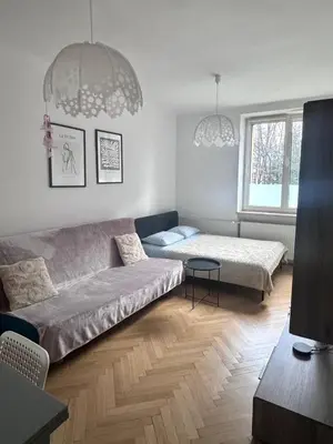 Łóżko lub łóżka w pokoju w obiekcie Metro Wiezbno Mokotów
