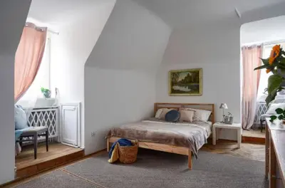 Łóżko lub łóżka w pokoju w obiekcie Old Town Nest Apartment