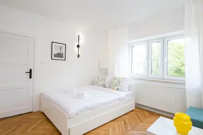 Łóżko lub łóżka w pokoju w obiekcie Nowolipie 531 Apartment by BookingHost