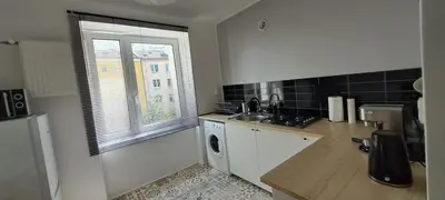 Kuchnia lub aneks kuchenny w obiekcie Klemens Apartment