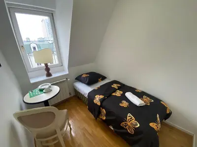 Łóżko lub łóżka w pokoju w obiekcie Fantastic-Inn Warszawa - CH30