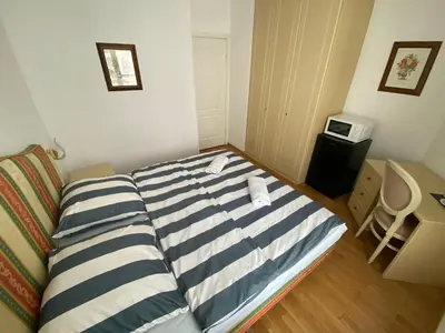 Łóżko lub łóżka w pokoju w obiekcie Fantastic-Inn Warszawa - CH30