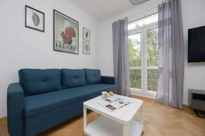 Część wypoczynkowa w obiekcie Stylish One Bedroom Apartment in Warsaw with Balcony by Noclegi Renters