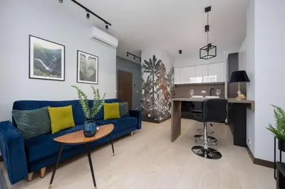 Kuchnia lub aneks kuchenny w obiekcie Ogrodowa Elegant Apartment with Parking and Air Conditioning in Warsaw by Noclegi Renters