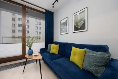 Część wypoczynkowa w obiekcie Ogrodowa Elegant Apartment with Parking and Air Conditioning in Warsaw by Noclegi Renters