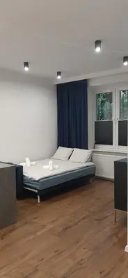 Łóżko lub łóżka w pokoju w obiekcie Old Warsaw