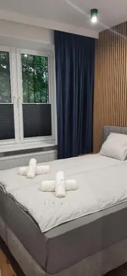 Łóżko lub łóżka w pokoju w obiekcie Old Warsaw