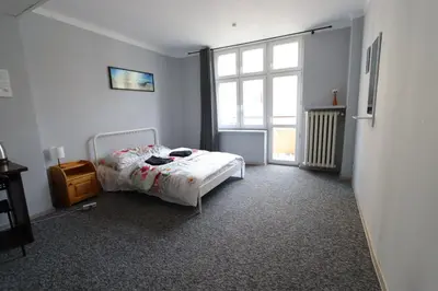 Łóżko lub łóżka w pokoju w obiekcie Fantastic-Inn Warszawa - Kopernika