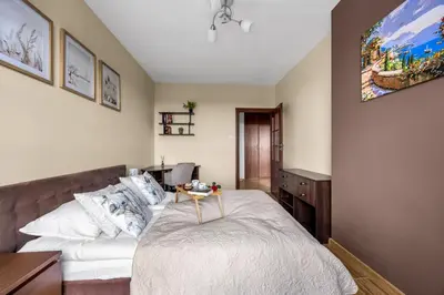 Łóżko lub łóżka w pokoju w obiekcie Mokotów Apt - 10th Floor, 52m2 - by Rentujemy