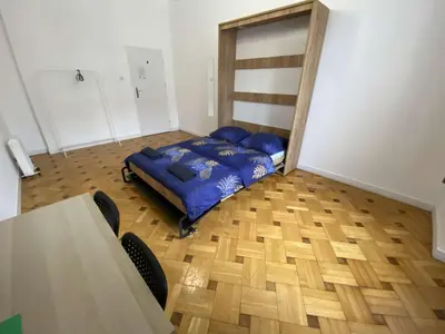 Łóżko lub łóżka w pokoju w obiekcie Fantastic-Inn Warszawa - NS38
