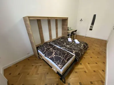 Łóżko lub łóżka w pokoju w obiekcie Fantastic-Inn Warszawa - NS38