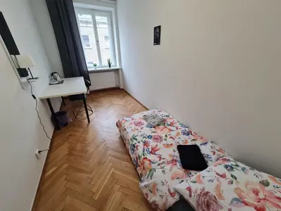 Łóżko lub łóżka w pokoju w obiekcie Fantastic-Inn Warszawa - Ordynacka