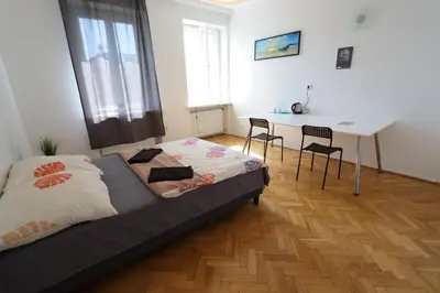 Łóżko lub łóżka w pokoju w obiekcie Fantastic-Inn Warszawa - Ordynacka