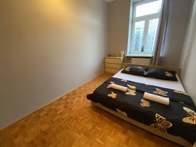 Łóżko lub łóżka w pokoju w obiekcie Fantastic-Inn Warszawa - Górskiego