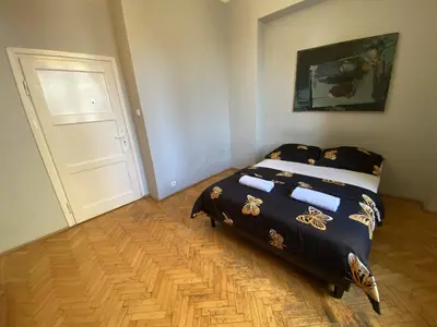 Łóżko lub łóżka w pokoju w obiekcie Fantastic-Inn Warszawa - Górskiego