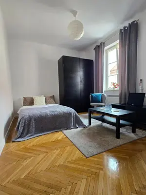 Łóżko lub łóżka w pokoju w obiekcie Apartamenty-MI Mariensztat