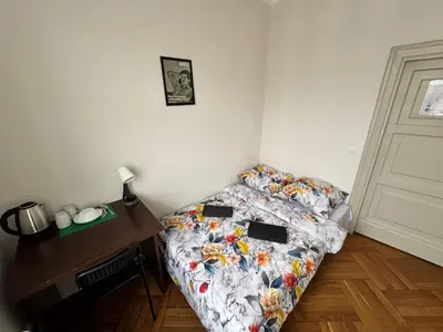 Łóżko lub łóżka w pokoju w obiekcie Fantastic-Inn Warszawa - NS25