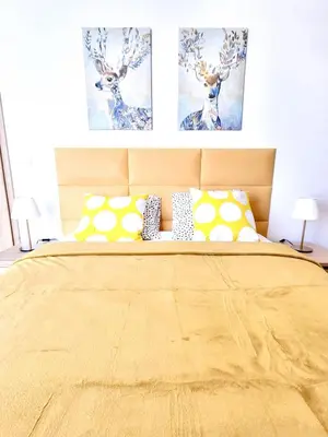 Łóżko lub łóżka w pokoju w obiekcie Ursus Premium Apartments