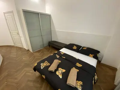 Łóżko lub łóżka w pokoju w obiekcie Fantastic-Inn Warszawa - Okólnik