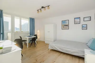 Łóżko lub łóżka w pokoju w obiekcie SuperApart Prosta 2 ROOMS
