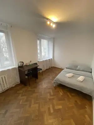 Łóżko lub łóżka w pokoju w obiekcie Fantastic-Inn Warszawa - Szczygla