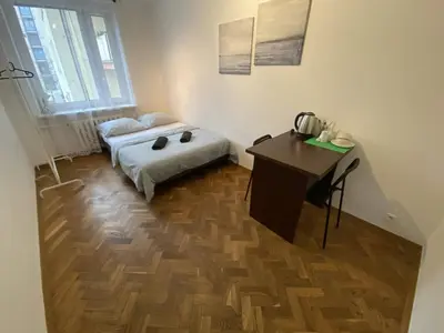 Łóżko lub łóżka w pokoju w obiekcie Fantastic-Inn Warszawa - Szczygla