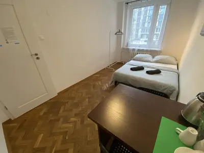 Łóżko lub łóżka w pokoju w obiekcie Fantastic-Inn Warszawa - Szczygla