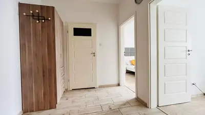 Łóżko lub łóżka w pokoju w obiekcie Rydygiera Modern Apartment 52 m2 with free parking Near Arkadia