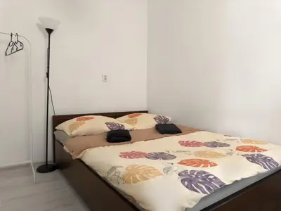 Łóżko lub łóżka w pokoju w obiekcie Fantastic-Inn Warszawa - NS54